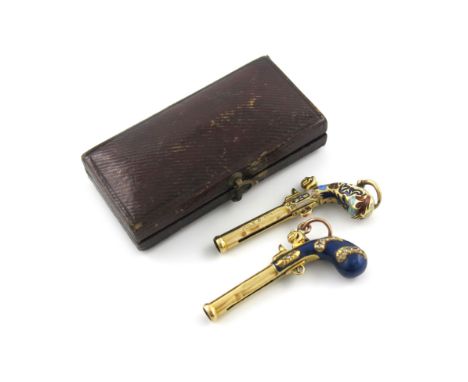 An early Victorian matched pair of novelty gold and enamel pencils, by S. Mordan, one engraved July 6, 1840. modelled as pist