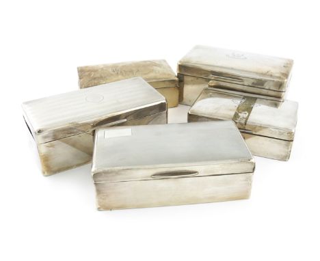 A collection of five silver cigarette boxes, various dates and makers, rectangular form, comprising one London 1928, the cove