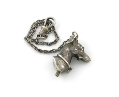 A Victorian novelty silver pencil, unmarked, modelled as a greyhound head, with a ring and chain attachment, length 3cm. Prov
