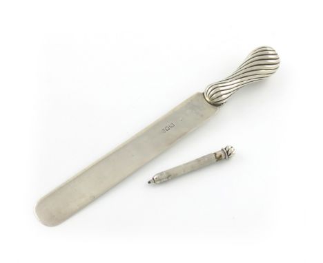 An Edwardian silver combination paper knife and pencil, by S. Mordan and Co, London 1901, fluted baluster handle with a pull-