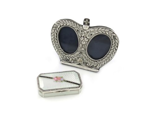An Edwardian commemorative silver photograph frame, by Jones &amp; Crompton, London 1901, modelled as a crown, with two oval 