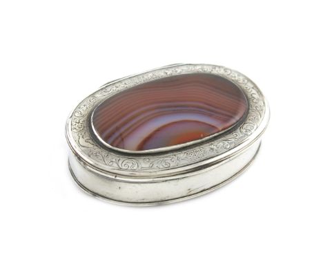 An 18th century silver and agate snuff box, unmarked circa 1760, oval form, the hinged cover set with an agate panel, and wit