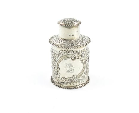 A Victorian silver tea canister, by Haseler &amp; Bill, Birmingham 1896, cylindrical form, embossed foliate scroll decoration