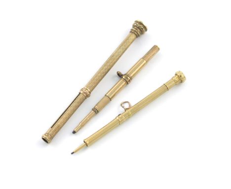 A Victorian 10-carat gold Everpointed pencil, marked with the arrow mark, engine-turned decoration and with hardstone finial,