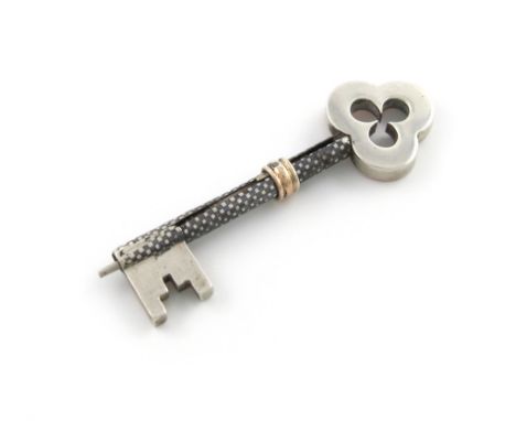 A Victorian gold, silver and niello work pencil, unmarked circa 1882, modelled as a key, with a pierced handle, inscribed and