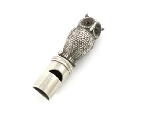 A Victorian novelty silver whistle and pencil, by S. Mordan and Co. modelled as an owl, set with glass eyes, length closed 5.