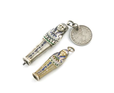 A 19th century novelty silver-gilt and enamel pencil, unmarked, modelled as an Egyptian mummy, with vari-coloured enamel deco