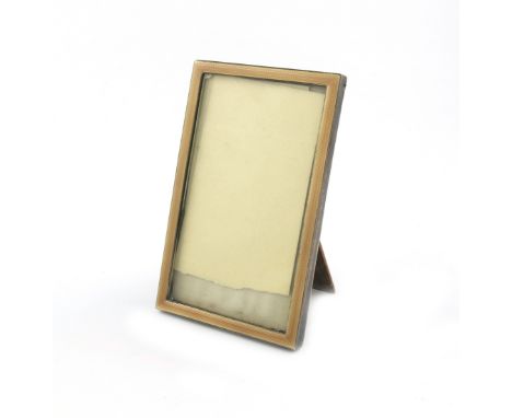 A silver and enamel photograph frame, by Albert Carter, Birmingham 1930, rectangular form, with butterscotch enamel decoratio