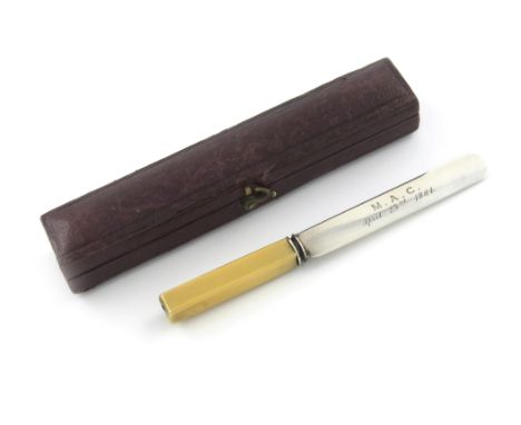 A Victorian novelty parcel-gilt silver pencil, unmarked, circa 1884, modelled as a table knife, rectangular handle, the blade