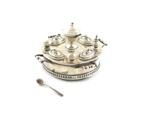 An American silver miniature entrée dish and condiment set on a revolving lazy susan, circa 1920, circular form, with four ha