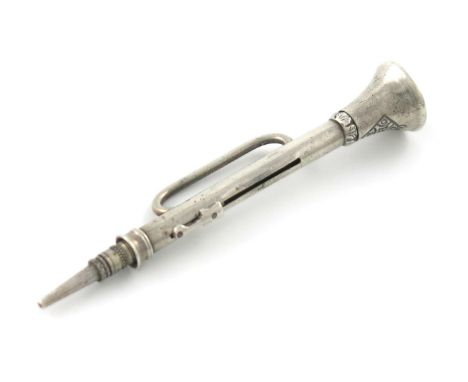 A novelty silver pencil, marked with a registration lozenge for 1844, modelled as a stylised trumpet, length 4.5cm. Provenanc