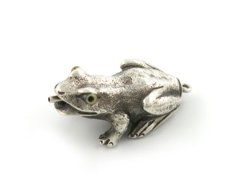 A novelty silver pencil, retailed by Hamilton and Co. Calcutta, modelled as a frog, set with glass eyes, ring terminal, lengt