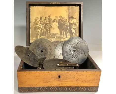 A 19th century Tunbridge ware box, later fitted with a symphonium movement, the horizontal mechanism playing 11.5cm discs on 