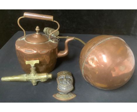 A copper kettle, a copper ball cock, a brass tap; a brass Richard I door knocker (4) 