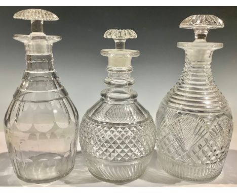 A post-Regency Prussian-shaped cut glass decanter, stepped shoulder above hobnail panels, mushroom stopper, 25cm high, c.1830