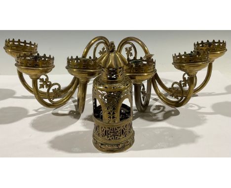 A pair of Gothic three branch candle lamps; a small pierced brass temple lamp 