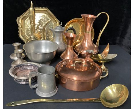 A trench art boat shaped pedestal box with pair of hinged covers; a brass ladle, a brass Persian style kettle; a copper two h