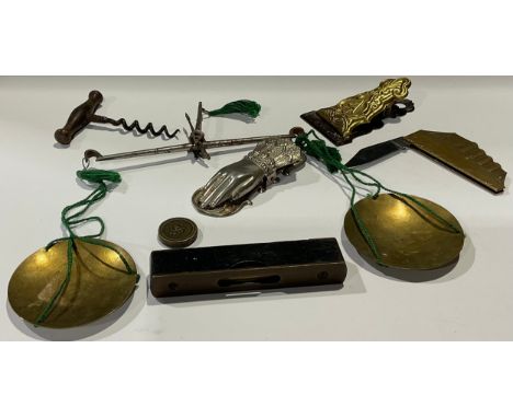 A set of 19th century hand balance scales; late 19th century document clips; a penknife, modelled as the Titanic; a corkscrew