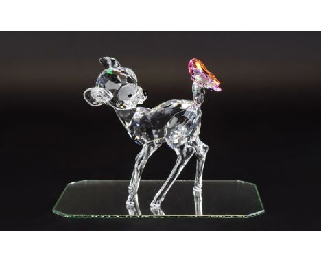 Swarovski Crystal Figure Disney Showcase Collection Bambi With Plaque Code number 9100 NR 000 114, issued 2008, retired 2012.