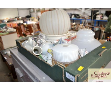 A box containing chamber pots, glass light fittings etc.