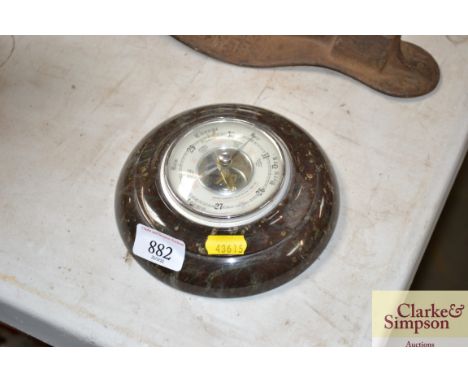 A marble housed barometer