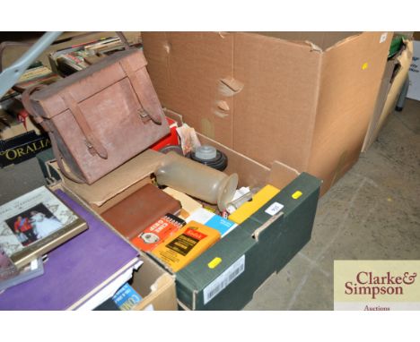 A box of vintage photographs processing hardware including a leather carry case
