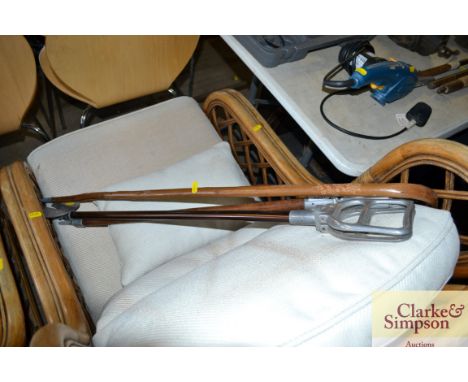 Two shooting sticks and a walking stick