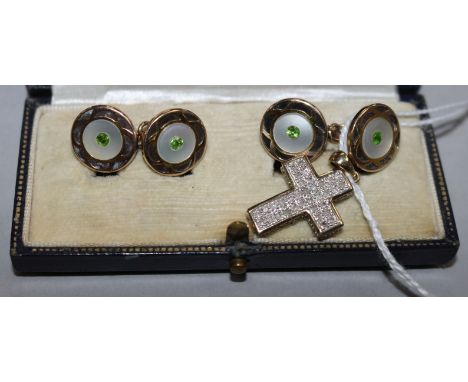 A stylish pair of 9ct gold, mother of pearl and demantoid garnet set cufflinks and a 9ct gold and diamond cross pendant.
