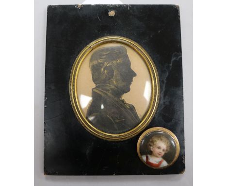 A gold mounted portrait miniature brooch and a silhouette of a gentleman