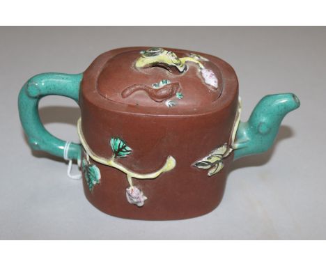 A 20th century Chinese terracotta and glazed pottery teapot