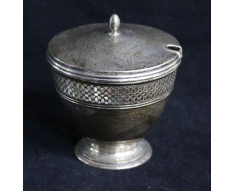 A Tiffany & Co sterling silver vase-shaped sugar bowl and cover, with ovoid finial and pierced lattice band, 8oz 8 oz.