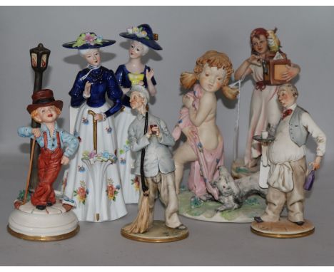 Five Capodimonte figures and a pair of modern Sitzendorf elegant ladies, the Capodimonte to include a gypsy organ grinder wit