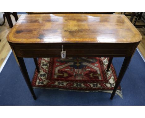 A Regency rosewood card table, with brass inset legs, W.92cm