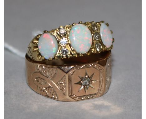 An 18ct three stone opal ring and a 9ct gold signet ring.