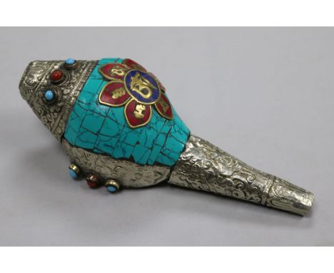 A Tibetan enamel and metal mounted conch shell