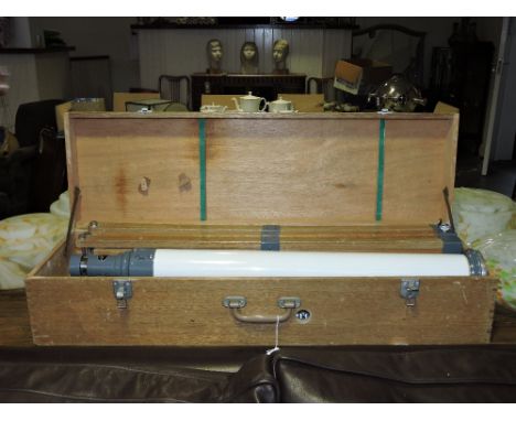 A mid 20th century SNS terrestrial telescope with oak tripod, boxed.
