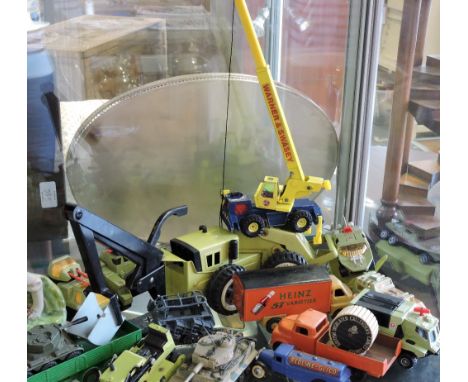 A collection of assorted Dinky, Corgi and Tonka die cast vehicles