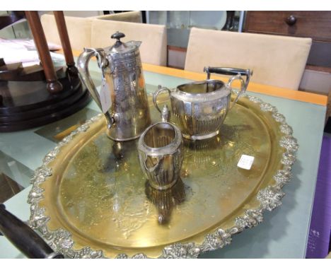A late Victorian silverplated 3 piece tea service embossed floral swags together with an ex plated two handled tea tray