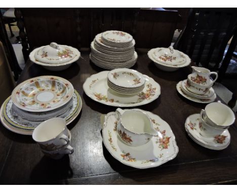 A Royal Doulton Wilton pattern 46 piece part dinner and tea service together with a 19th century Derby muffin dish base and s