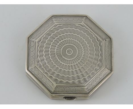 A George V engine turned octagonal silver compact, Birmingham 1931