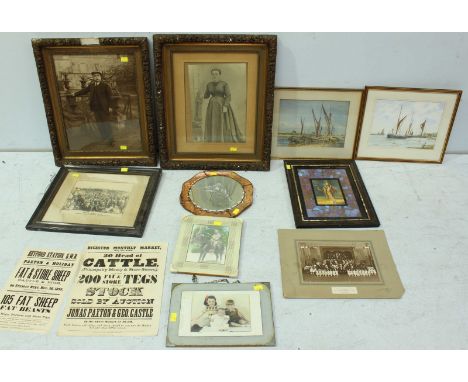 A collection of assorted prints including a pair of framed photographs, two watercolours, a mirror and other various prints. 