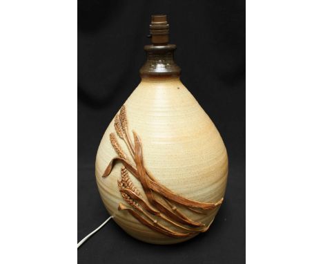 A heavy stoneware table lamp, decorated with applied wheat ears and leaves. 35 cm high.