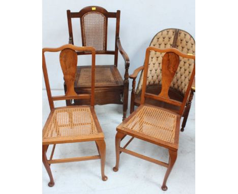 A pair of walnut cane seated single chairs, together with a carved oak commode chair and an oak tub chair. (4)