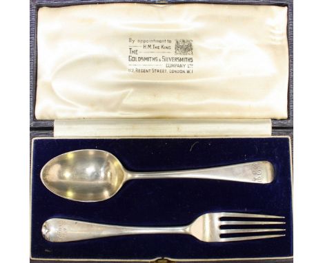 A Goldsmiths & Silversmiths cased fork and spoon set, hallmarked London 1935. 2 oz.
