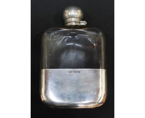 A Victorian silver and glass hip flask, hallmarked Sheffield 1899 by James Dixon & Sons.