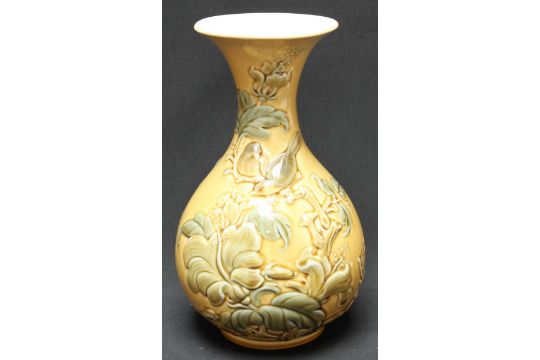 A Lladro Porcelain Baluster Vase Moulded In Relief With Birds