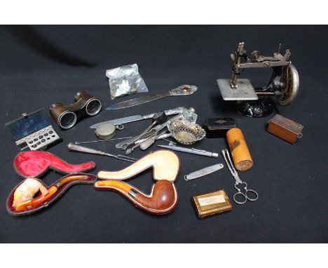 A collection of assorted items including a Meerschaum pipe and another, a miniature sewing machine, silver plated items, Zeis