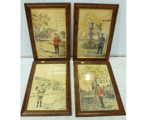 A set of four military prints of soldiers in burr walnut frames.