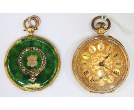 A ladies small 18K fob watch with gilt dial and black Roman numerals. Total weight: 31.2 grams. Together with a yellow metal 