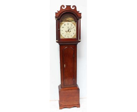 An early 19th Century long case clock, with eight day striking movement, the painted square dial with arched top and decorate